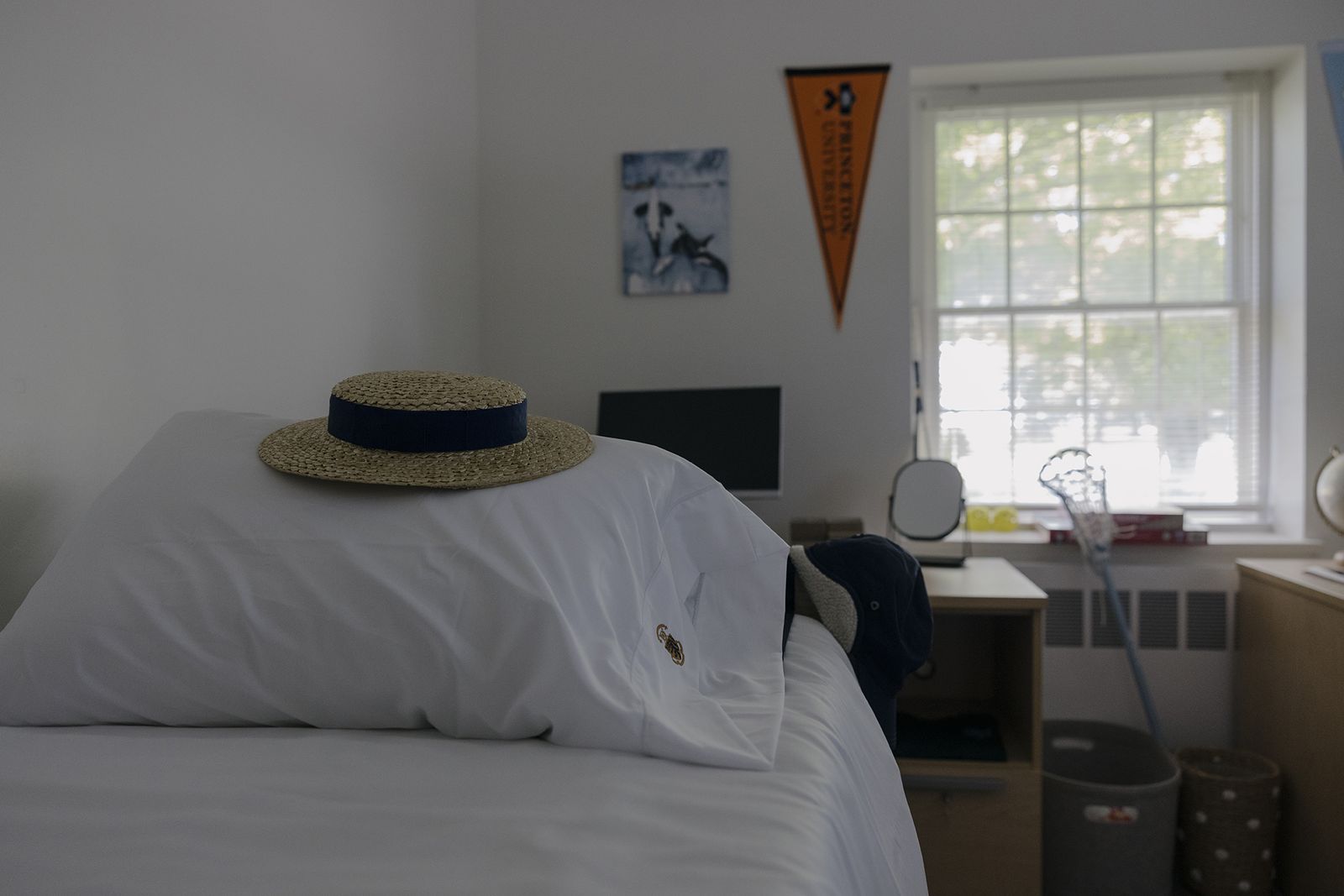 Image may contain Indoors Interior Design Furniture Clothing Hat Computer Hardware Electronics Hardware and Monitor