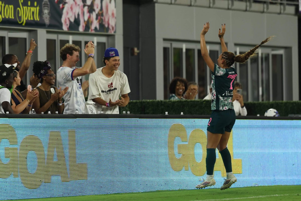 USWNT’s Trinity Rodman and tennis star Ben Shelton lean on each other at the top of their sports