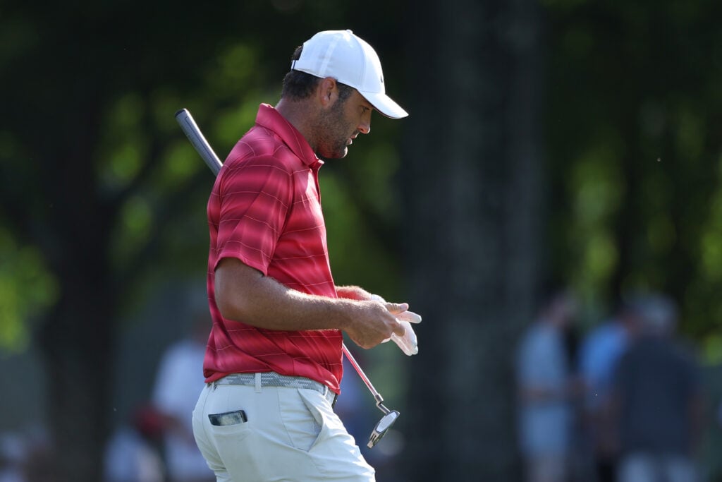 Scottie Scheffler walks towards the 17th green at East Lake during the third round of the Tour Championship