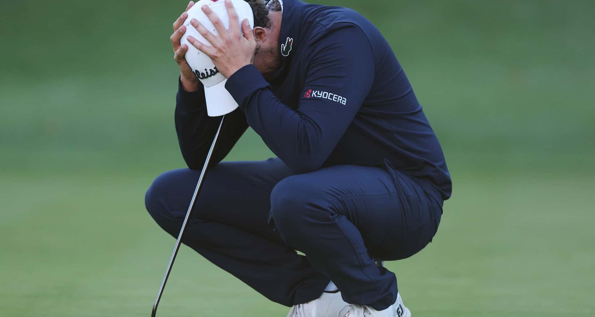 VIRGINIA WATER, ENGLAND - SEPTEMBER 20: Manuel Elvira of Spain reacts following a double bogey on the 18th green on day four of the BMW PGA Championship at Wentworth Golf Club on September 20, 2026 in Virginia Water, England. (Photo by Andrew Redington/Getty Images)