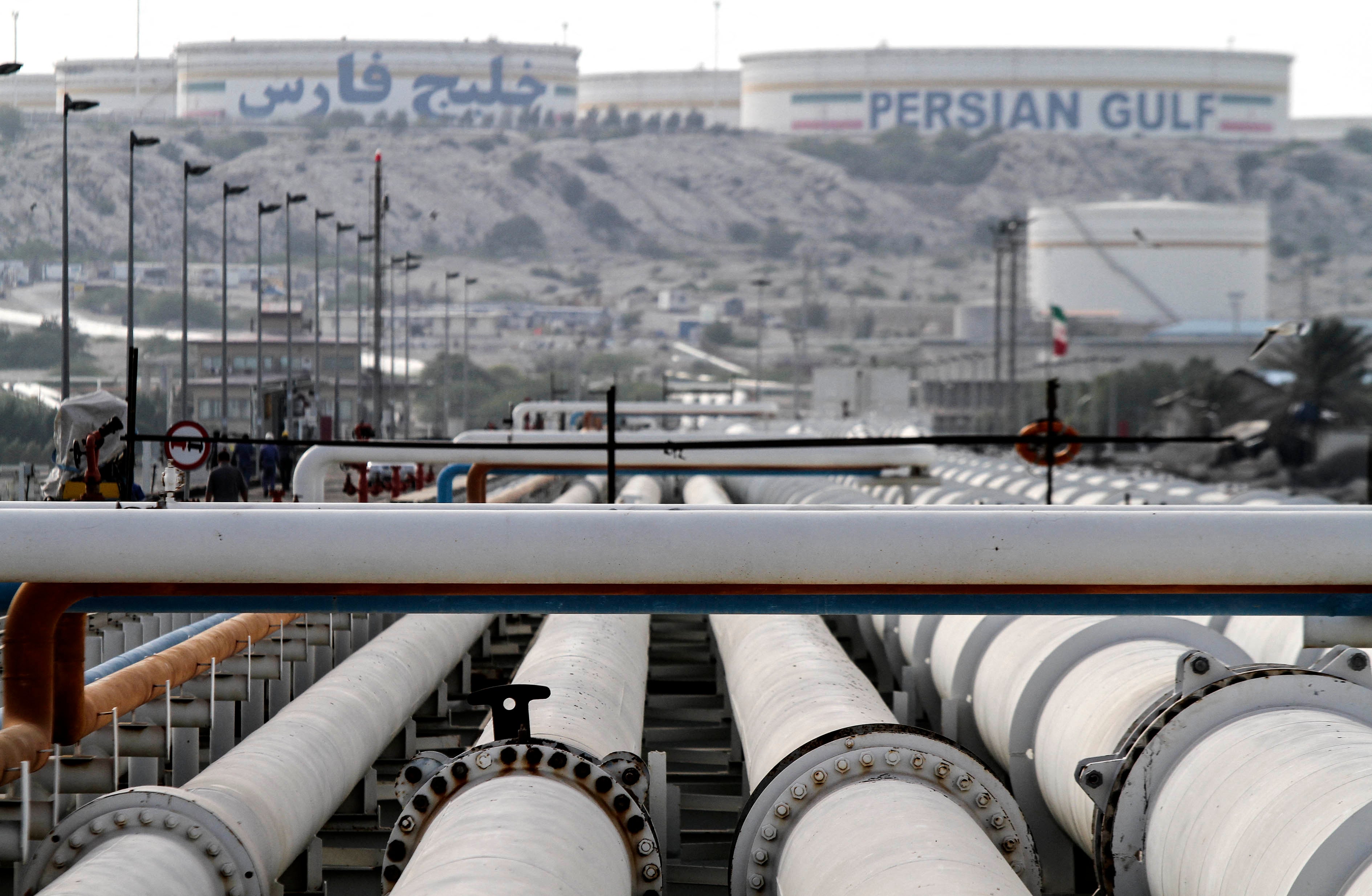 A picture shows export oil pipelines at an oil facility in the Khark Island, on the shore of the Gulf, on 23 February 2016