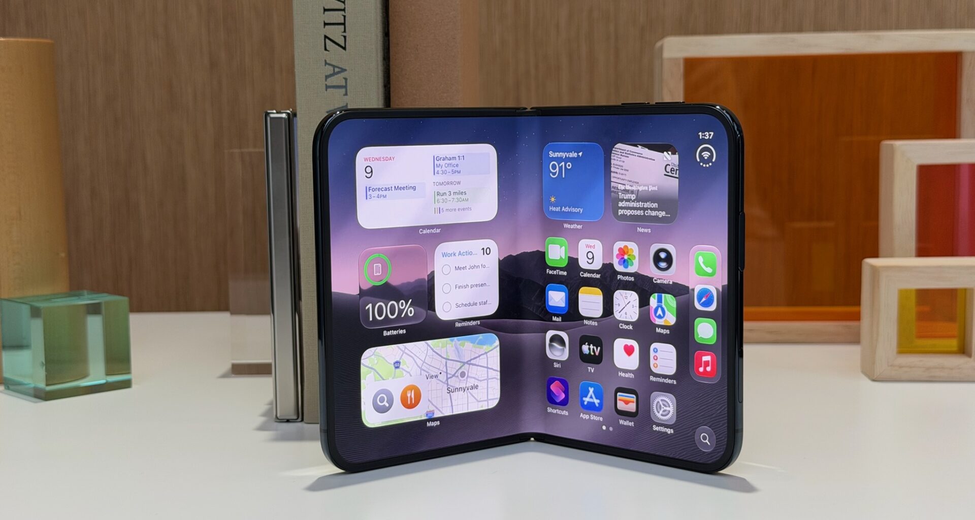 iPhone duo is sitting upright partially opened
