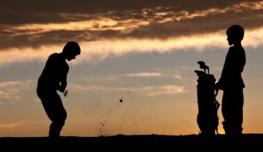 Silhouette of junior golfers