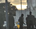 Masked protesters march in Dover