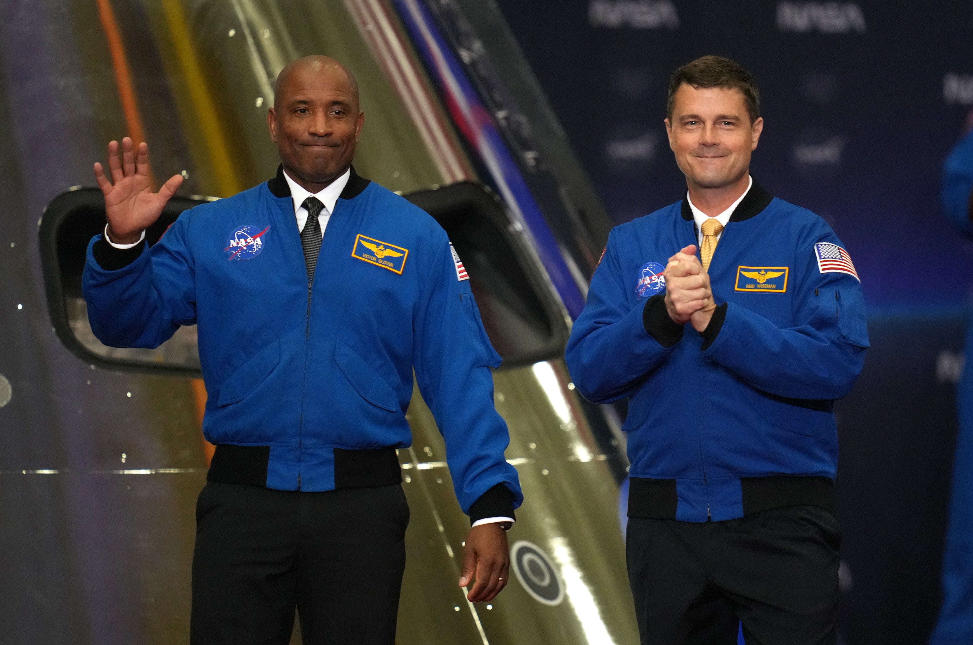 Artemis II Pilot Victor Glover (left) and Commander Reid Wiseman, participate in a Congressional Space Medal of Honor ceremony at NASA's Johnson Space Center