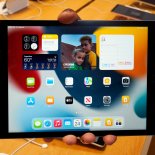 Apple 9th generation iPad is displayed on its first day of sale, in New York, Friday, Sept. 24, 2021. (AP Photo/Richard Drew)