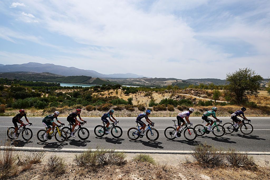 LOJA, SPAIN - SEPTEMBER 04: (L-R) Filippo Zana of Italy and Team Soudal Quick-Step, Jesus Herrada of Spain and Team Burgos Burpellet BH, Ivan Cobo of Spain and Team Equipo Kern Pharma, Eddie Dunbar of Ireland and Team Pinarello - Q36.5 Pro Cycling and a general view of the chase group passing the Alto del Legionario (1325m) during the La Vuelta - 81st Tour of Spain 2026, Stage 13 a 192.8km stage from Almu&amp;ntilde;ecar to Loja 501m / #UCIWT / on September 04, 2026 in Loja, Spain. (Photo by Tim de Waele/Getty Images)