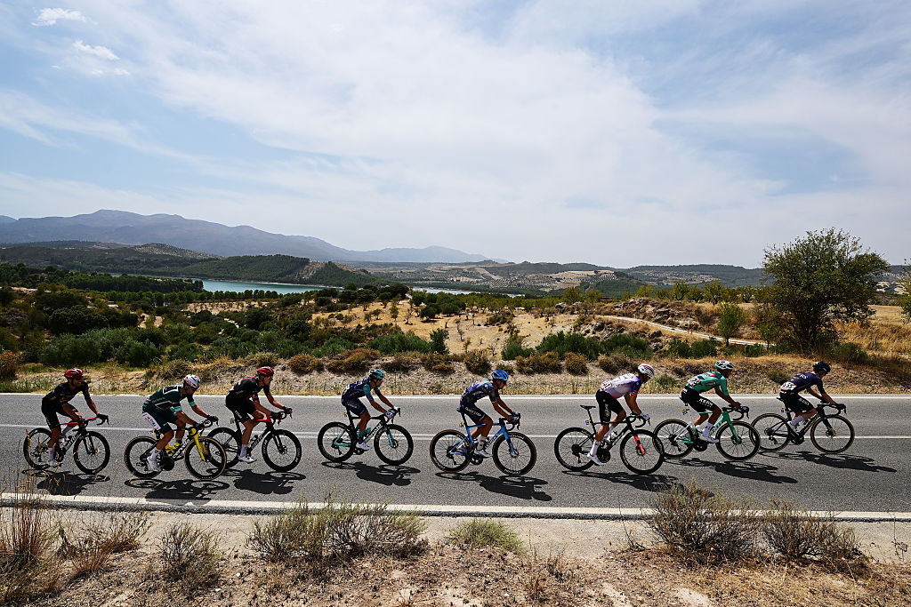LOJA, SPAIN - SEPTEMBER 04: (L-R) Filippo Zana of Italy and Team Soudal Quick-Step, Jesus Herrada of Spain and Team Burgos Burpellet BH, Ivan Cobo of Spain and Team Equipo Kern Pharma, Eddie Dunbar of Ireland and Team Pinarello - Q36.5 Pro Cycling and a general view of the chase group passing the Alto del Legionario (1325m) during the La Vuelta - 81st Tour of Spain 2026, Stage 13 a 192.8km stage from Almu&ntilde;ecar to Loja 501m / #UCIWT / on September 04, 2026 in Loja, Spain. (Photo by Tim de Waele/Getty Images)