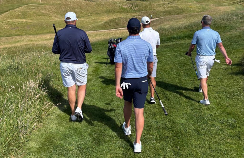 Rory McIlroy, Shane Lowry, Luke Donald and Finn Ellis walking down the St Enodoc fairway | Source: Tim Cowley

Rory McIlroy at St Enodoc