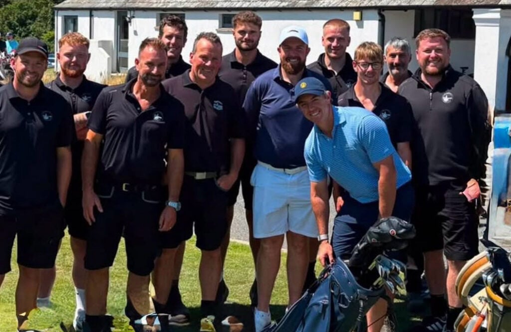 Rory McIlroy and Shane Lowry pose with St Enodoc's green keeping team | Source: Chris Mitchell