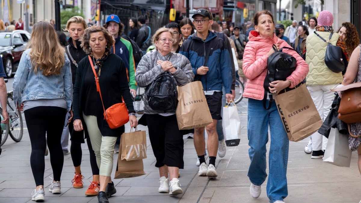 Shoppers and visitors on Oxford Street carrying shopping bags on 9th June 2024 in London, United Kingdom. Oxford Street is a major retail centre in the West End of the capital and is Europes busiest shopping street with around half a million daily visitors to its approximately 300 shops, the majority of which are fashion and high street clothing stores. (photo by Mike Kemp/In Pictures via Getty Images)