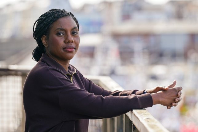 BRIDLINGTON, ENGLAND - MAY 23: Conservative party leader Kemi Badenoch poses for pictures as she visits Bridlington Harbour to meet with members of the fishing community on May 23, 2025 in Bridlington, England. Leader of the Conservative Party, Kemi Badenoch, visits to talk to the fishing community in response to the Prime Minister's new deal with the EU that grants European trawler fleets 12 years of access to UK waters in a rollover of the existing fisheries deal to 2038. The government claims the deal will benefit the British fishing industry by allowing fish caught in UK waters to be sold in the EU without veterinary checks, removing a costly post-Brexit barrier. Starmer has also unveiled a ??360m fund to support fishing communities and modernise the British fishing fleet. (Photo by Ian Forsyth/Getty Images)