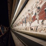 People look at the "Bayeux tapestry" or "Queen Mathilde tapestry" which relates Britain's conquest by William the Conqueror (Guillaume le Conquerant) in 1066, in Bayeux, western France, on September 13, 2019. (Photo by LOIC VENANCE / AFP) (Photo credit should read LOIC VENANCE/AFP via Getty Images)