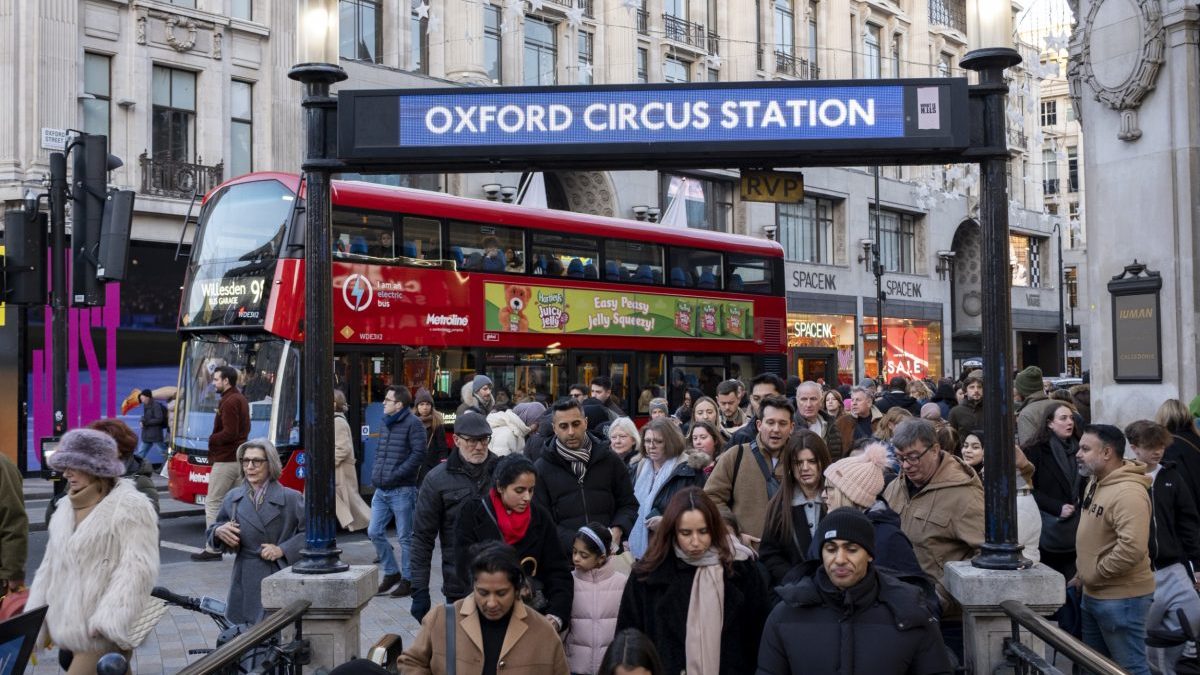 Shoppers and visitors out on Oxford Street walk down the steps into a very busy Oxford Circus underground station on 4th January 2026 in London, United Kingdom. Oxford Street is a major retail centre in the West End of the capital and is Europes busiest shopping street with around half a million daily visitors to its approximately 300 shops, the majority of which are fashion and high street clothing stores. (photo by Mike Kemp/In Pictures via Getty Images)