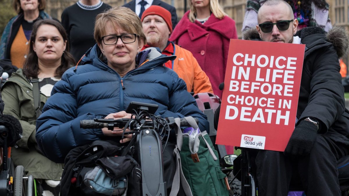 LONDON, UNITED KINGDOM - MARCH 24, 2025: Baroness Grey-Thompson (L) and disabled people who oppose assisted dying demonstrate outside the Houses of Parliament as Kim Leadbeater's Assisted Dying Bill enters the final week of its committee stage in London, United Kingdom on March 24, 2025. (Photo credit should read Wiktor Szymanowicz/Future Publishing via Getty Images)