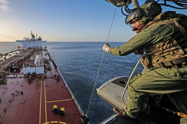 This handout picture taken on June 14, 2026 and released by the British Ministry of Defence (MOD) shows 421 Commando of the UK Commando force conducting maritime interdiction operations on the CMR Smyrtos sailing under a false Cameroonian flag, in the English Channel off the coast of the United Kingdom. British forces on June 14 intercepted a sanctioned oil tanker belonging to Russia's shadow fleet in the English Channel, the defence ministry said, in a six-hour operation hailed by Kyiv. (Photo by Ministry of Defence (United Kingdom) / AFP via Getty Images) / - NO Marketing campaign / -----EDITORS NOTE --- RESTRICTED TO EDITORIAL USE - MANDATORY CREDIT "AFP PHOTO / UK Ministry of Defence CROWN COPYRIGHT, 2026 " - NO MARKETING - NO ADVERTISING CAMPAIGNS - DISTRIBUTED AS A SERVICE TO CLIENTS - NO ARCHIVES - TO BE USED WITHIN 2 DAYS FROM JUNE 14, 2026 (48 HOURS), EXCEPT FOR MAGAZINES WHICH CAN PRINT THE PICTURE WHEN FIRST REPORTING ON THE EVENT /