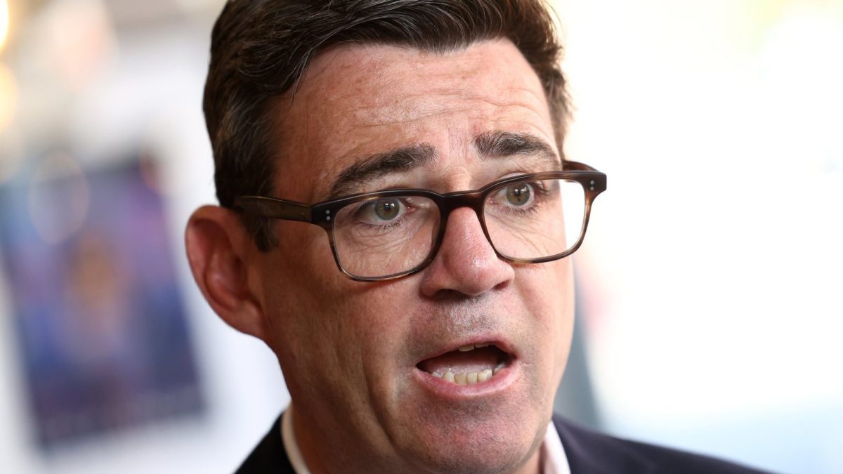 ILKESTON, ENGLAND - AUGUST 11: UK Prime Minister Andy Burnham speaks during a TV interview at The Hub cafe following during a visit on August 11, 2026 in Ilkeston, England. (Photo by Toby Shepheard - WPA Pool/Getty Images)