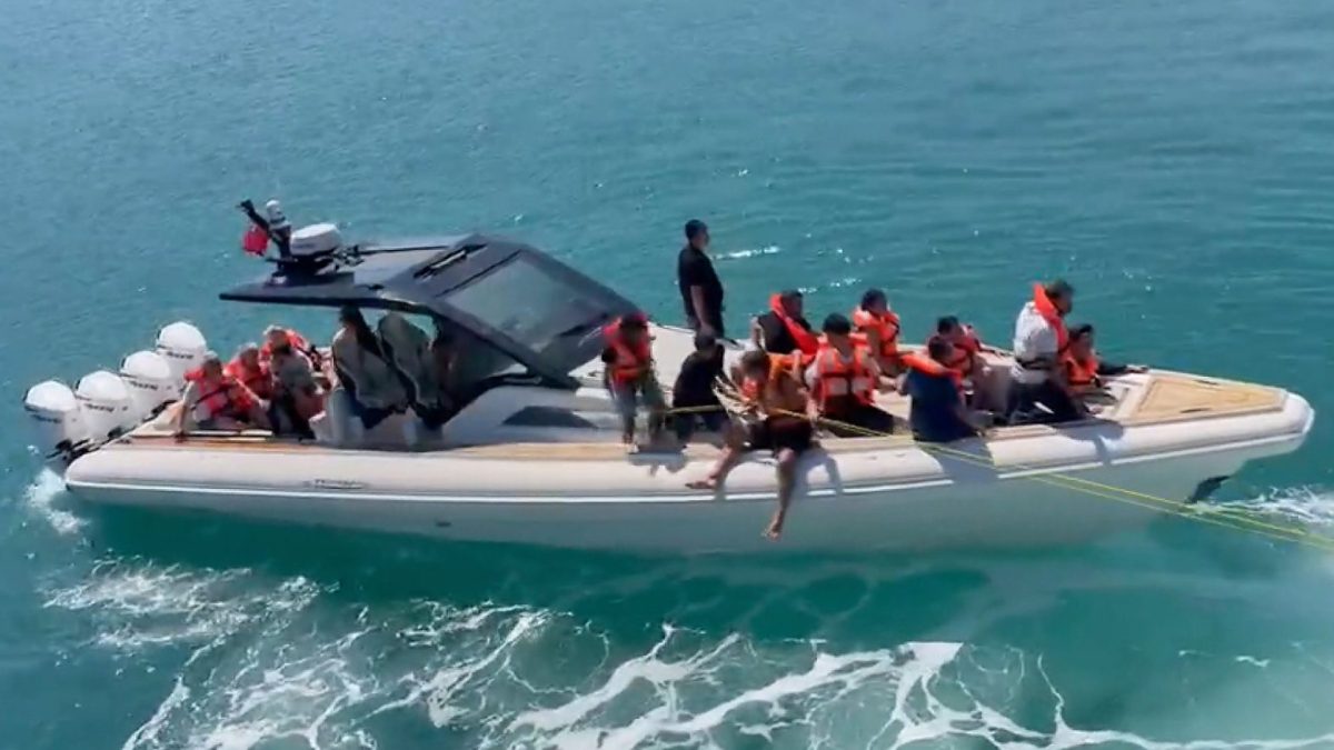 In this frame grab from video, rescued passengers wearing life jackets are evacuated by boat after a passenger vessel capsized off the coast of Girne, in the Turkish-occupied northern part of Cyprus, Sunday, Aug. 30, 2026. (DHA via AP)