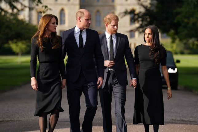 (L-R) Britain's Catherine, Princess of Wales, Britain's Prince William, Prince of Wales, Britain's Prince Harry, Duke of Sussex, and Meghan, Duchess of Sussex on the long Walk at Windsor Castle on September 10, 2022, before meeting well-wishers. King Charles III pledged to follow his mother's example of "lifelong service" in his inaugural address to Britain and the Commonwealth on Friday, after ascending to the throne following the death of Queen Elizabeth II on September 8. (Photo by Kirsty O'Connor / POOL / AFP) (Photo by KIRSTY O'CONNOR/POOL/AFP via Getty Images)