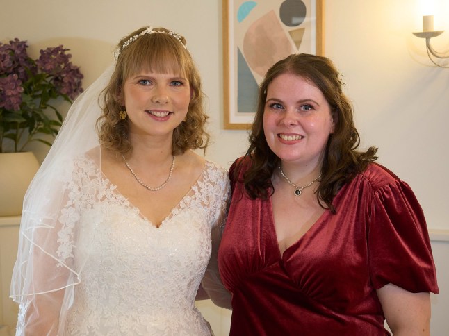 Bethany Taylor alongside her friend Rosie in a wedding dress