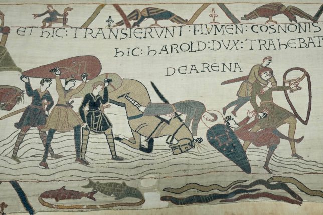 The 70-meter-long Bayeux Tapestry is displayed during a press preview at the British Museum in London after returning to England, following a historic agreement between the UK and France, Monday, Sept. 7, 2026. (AP Photo/Kin Cheung)