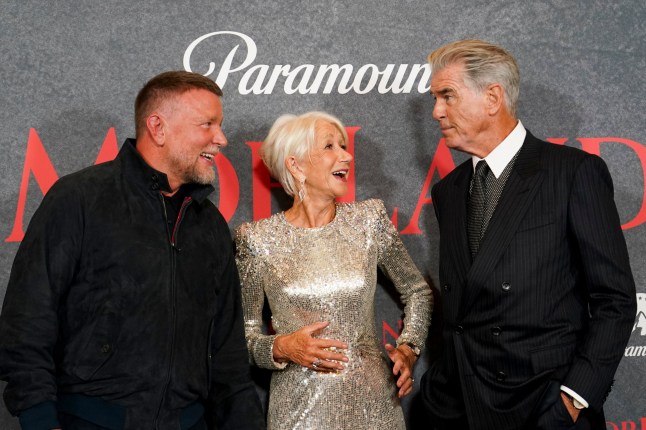 Guy Ritchie, left, Helen Mirren, centre, and Pierce Brosnan, pose for photographers upon arrival the 'Mobland Season Two Premiere' premiere in London, England, Thursday, Sept. 10, 2026. (Photo by Alberto Pezzali/Invision/AP)