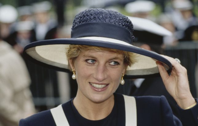 British Royal Diana, Princess of Wales (1961-1997), wearing a blue-and-white Catherine Walker suit and matching hat, attends the service marking the 50th anniversary of World War II's Battle of the Atlantic, held at Liverpool Anglican Cathedral, in Liverpool, England, 30th May 1993. (Photo by Tim Graham Photo Library via Getty Images)
