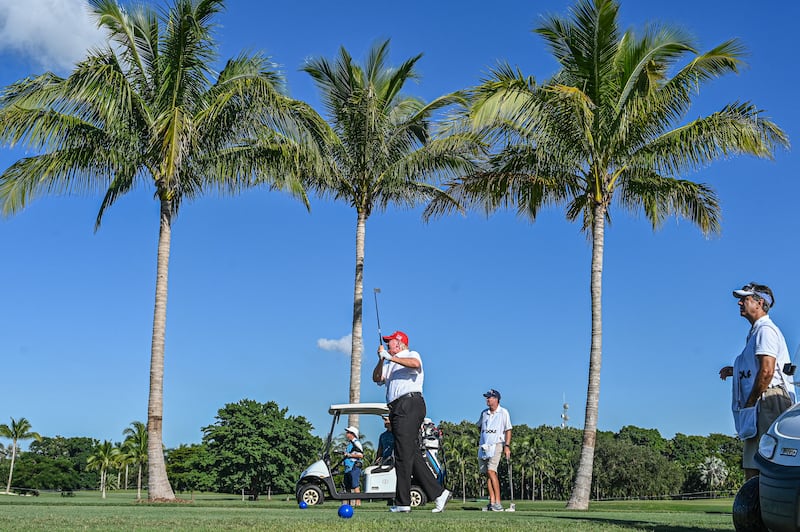 Donald Trump plays golf at Trump National Doral Miami in 2022. Photograph: Giorgio Viera/AFP via Getty