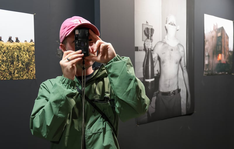 Kyiv-based, Emmy Award-winning video and photojournalist Conall Kearney, from West Belfast, at his exhibition Chaos Stadt at Belfast Exposed. PICTURE: BRIAN LINCOLN