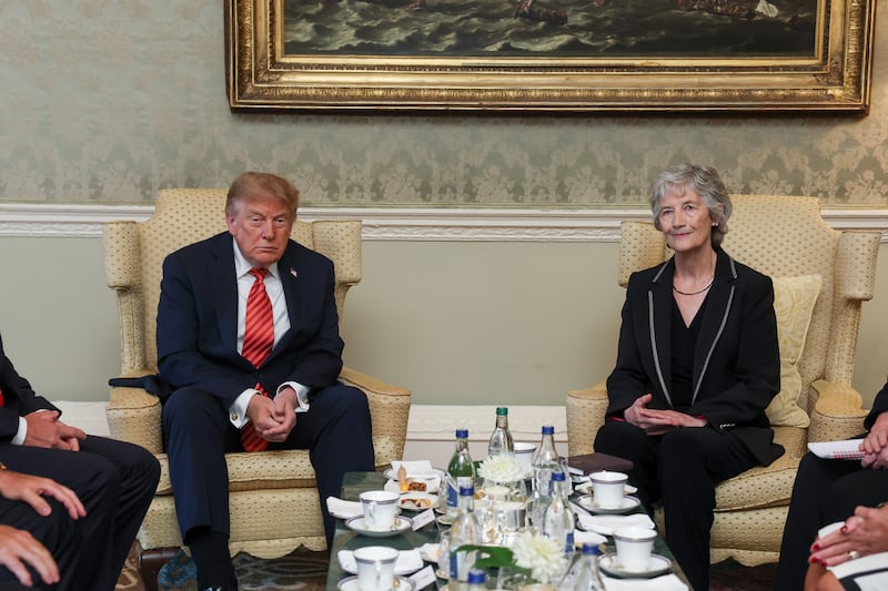 President Catherine Connolly and US president Donald Trump at Aras an Uachtarain during a courtesy call at the start of his trip to Ireland. Photograph: Tony Maxwell/Maxwells/PA Wire 