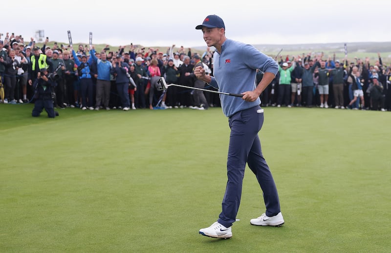 Josh Hill celebrates winning his match against  Tyler Watts of the USA on the 18th green at Lahinch to secure the Walker Cup for Great Britain and Ireland for the first time since 2015. Photograph: Warren Little/Getty Images