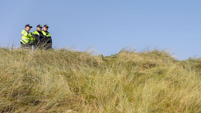 Members of An Garda Síochána watching over the course. Photograph: Ben Brady/Inpho
