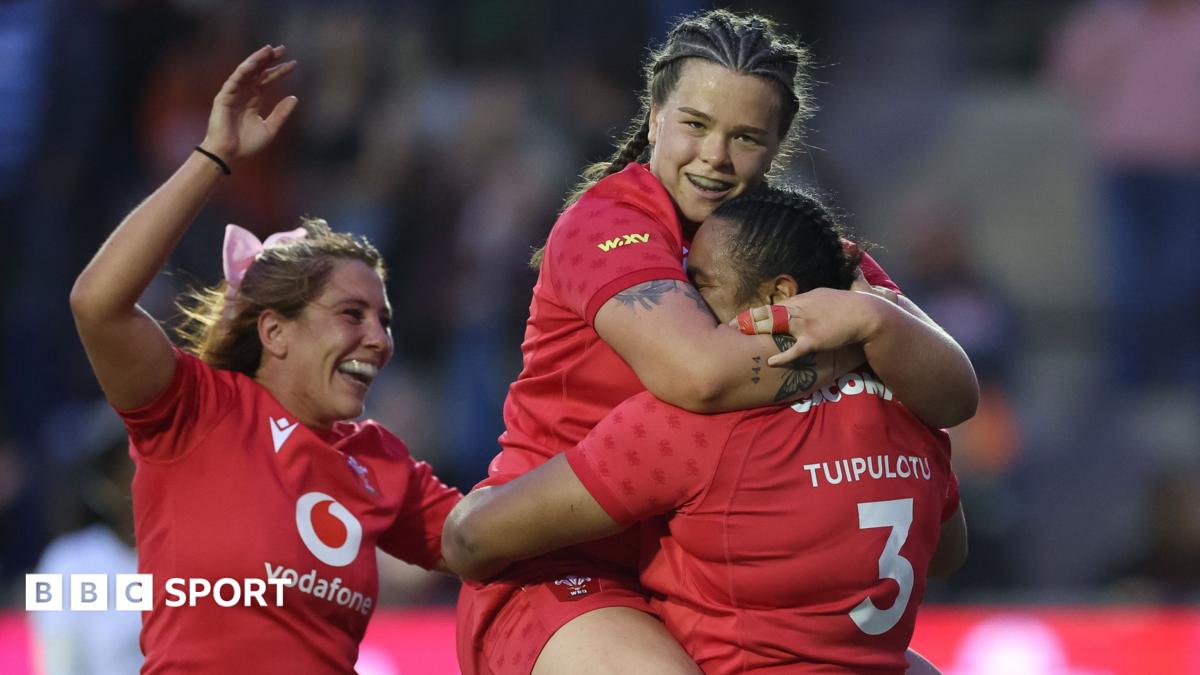 Courtney Keight celebrates with team-mates