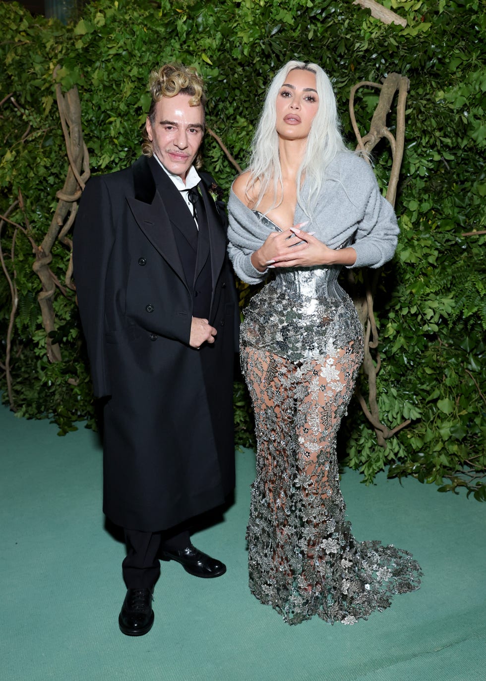 new york, new york may 06 lr john galliano and kim kardashian attend the 2024 met gala celebrating sleeping beauties reawakening fashion at the metropolitan museum of art on may 06, 2024 in new york city photo by cindy ordmg24getty images for the met museumvogue