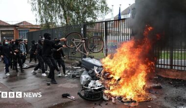 Black smoke billows from burning bins and bicycles as students carry out a blocking protest at the Cesar Baggio secondary school during a day of nationwide public sector strikes and demonstrations, in Lille, on September 29, 2026.