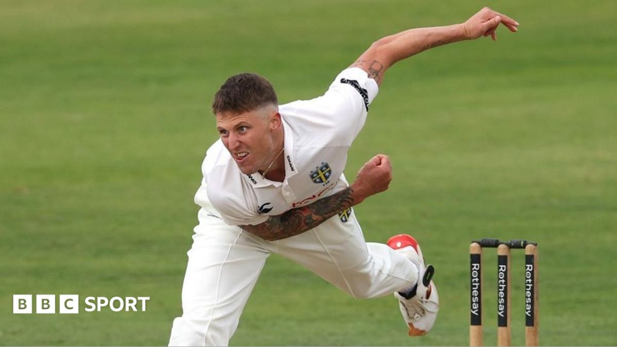 Brydon Carse bowling for Durham