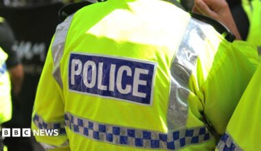 Generic police image of back of officer