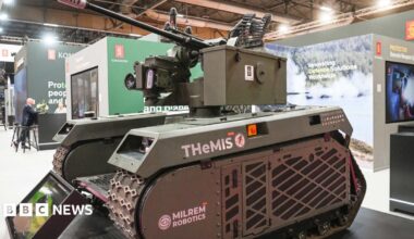 Unmanned ground vehicle built by Milrem Robotics on display at an exhibition in Paris