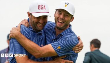 Scottie Scheffler and Sam Burns celebrate