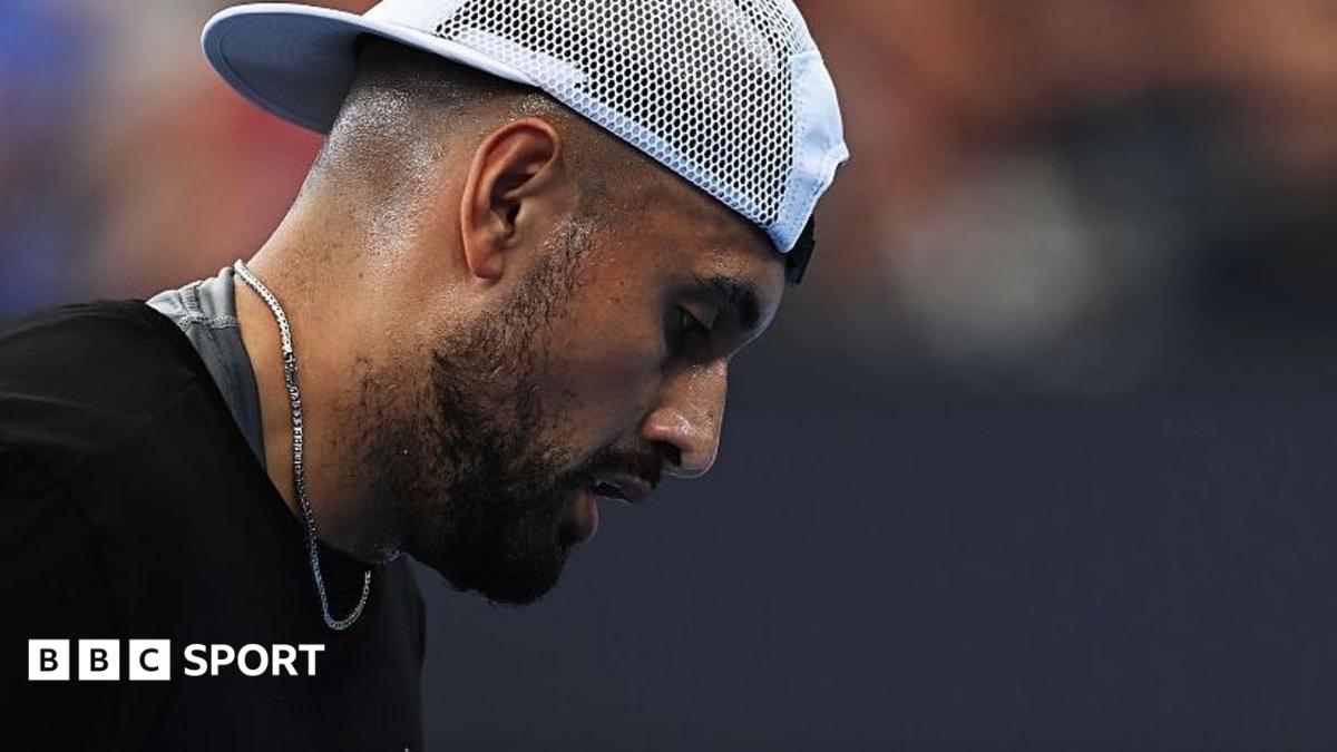 Nick Kyrgios looks down during a match