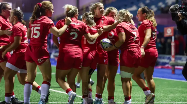 Wales celebrate Alex Callender's try against South Africa