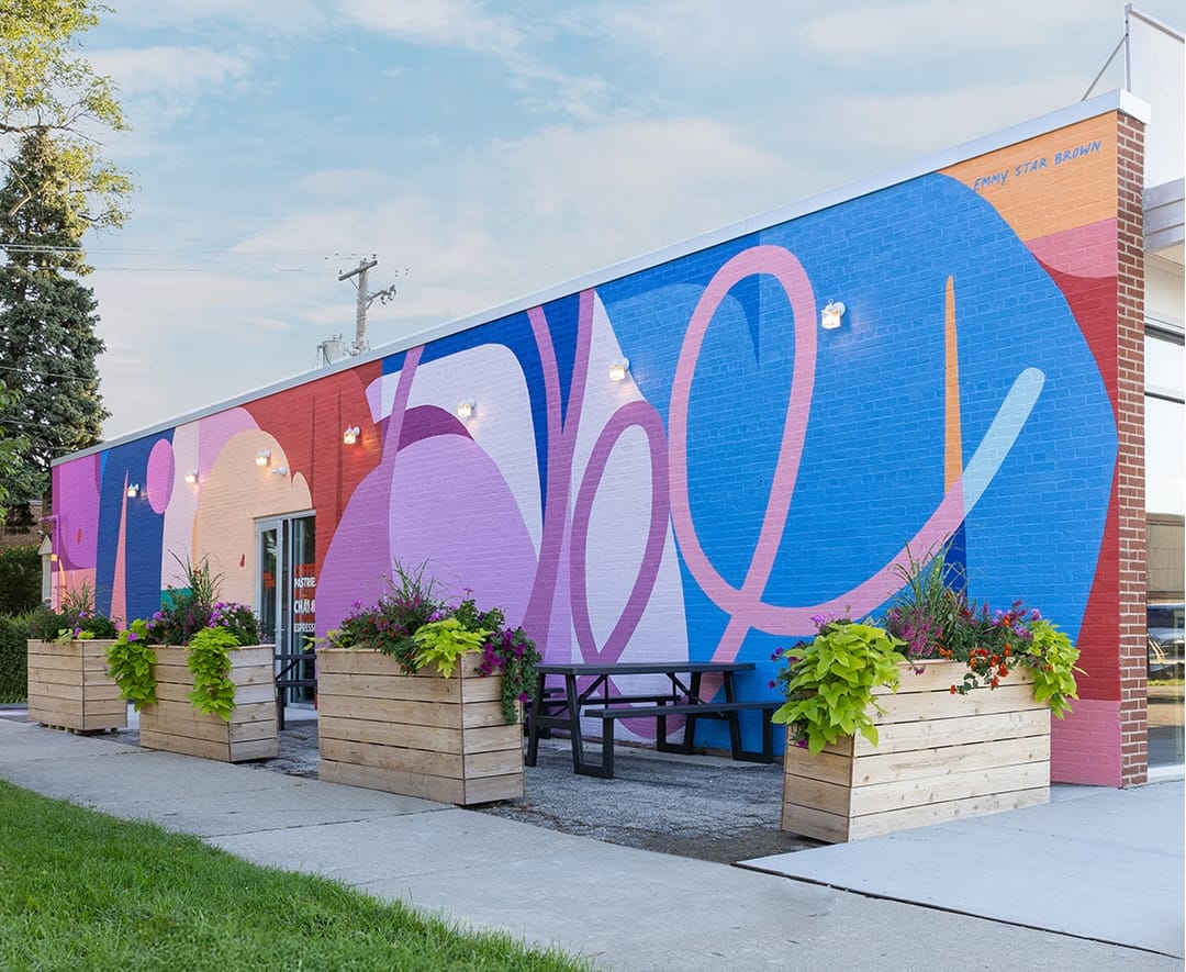a colorful, abstract mural on a wall by Emmy Star Brown