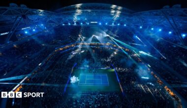 A view above Arthur Ashe Stadium as a light show takes place before the night session