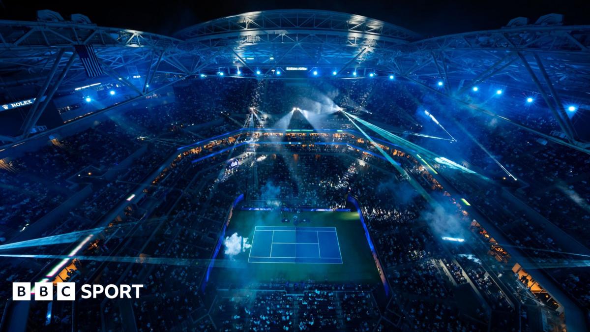 A view above Arthur Ashe Stadium as a light show takes place before the night session