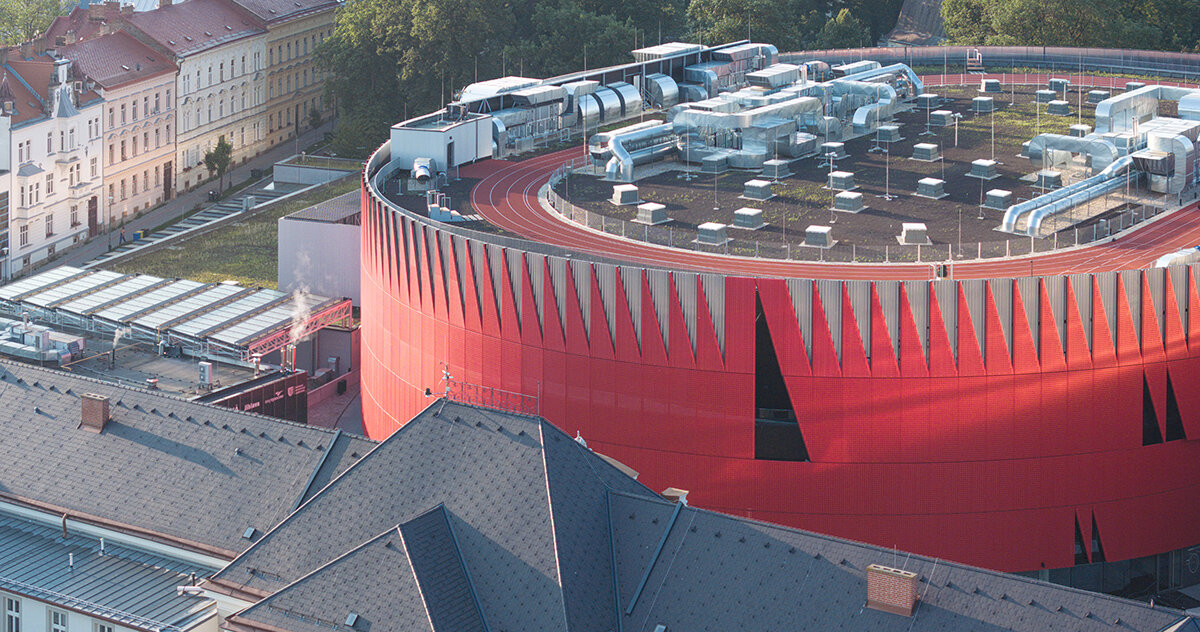 CH+K wraps jihlava arena in a jagged red aluminum crown