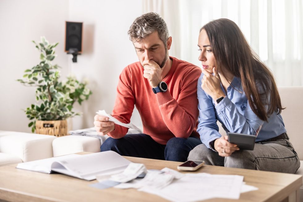 Couple worried at receipts
