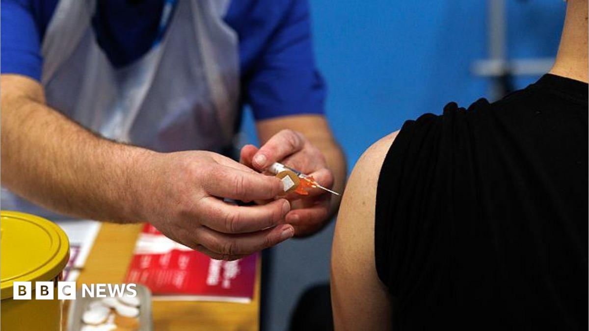 A student receives the Meningitis B vaccine in Kent.
