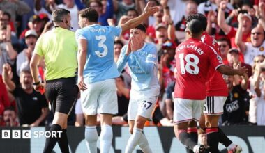 Manchester City's Phil Foden reacts after being sent off against Manchester United at Old Trafford
