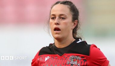 Ffion Lewis looks on during play