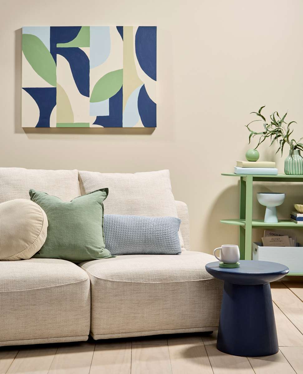 A contrast pattern and depth of colour bring rich warmth to this room that still feels inspired by the coast. Project by Annick Larkin. Mural Hannah Tapner.  Photo / Bryce Carleton